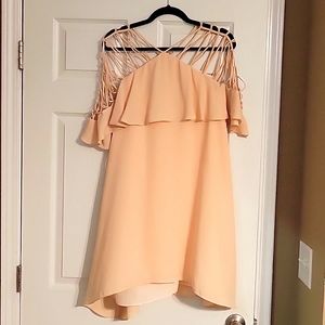 Pink flowing dress with arm detail